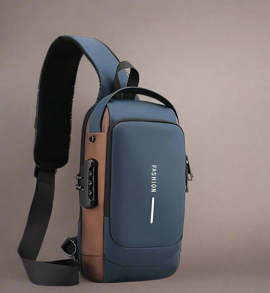 Blue and brown sling bag with USB port on a white background